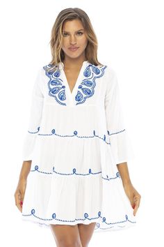 BEAUTIFUL BOHO SUMMER DRESS with exquisite embroidery around the deep V-neck, and a romantic Greek inspired style. This comfy loose dress will be your go-to for at home wear, in the city, or dinner out FLOWY RUFFLED SKIRT with a soft silky feel is flattering at the hips, and moves with you for comfort and style. Pretty ¾ length bell sleeves and tiered flounce are accented with gorgeous artisan embroidery on the front and back 100% RAYON. Moisture absorbent and quick drying, this feminine beach d Boho Summer Dress, Short Sundress, Boho Print Dress, Boho Beach Dress, Turquoise Dress, Perfect Swimsuit, Boho Summer Dresses, White Dress Party, Ruffled Skirt