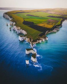 an aerial view of the cliffs and sea