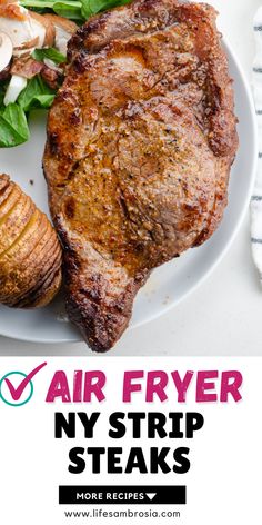 a plate with steak, spinach and mushrooms on it that says air fryer ny strip steaks