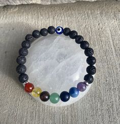 Beautiful beaded evil eye chakra bracelet Bead Evil Eye, Beaded Evil Eye, Body Balance, Chakra Bracelet, Lava Bead, Eye Bracelet, Evil Eye Bracelet, Colorado Springs, Evil Eye