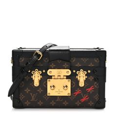 This is an authentic LOUIS VUITTON Monogram Petite Malle in Black. This trunk-style bagis crafted of Louis Vuitton monogram on coated canvas. The bag features black leather trim, an optional, adjustable black leather shoulder strap, and crossover top flap with gold-toned press lock and buckles on either side. The corners are reinforced with black hardware end caps. The bag opens to a beige leather interior with a patch pocket. Louis Vuitton Monogram Bag, Favorite Mm, Black Louis Vuitton, Louis Vuitton Crossbody Bag, Louis Vuitton Clutch, Crossover Top, Louis Vuitton Crossbody, Louis Vuitton Empreinte, Louis Vuitton Damier Azur