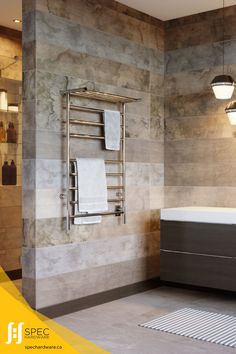 a bathroom with a sink, towel rack and bathtub