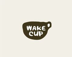 the words wake cup are written in white on a black and brown background with an oval shape