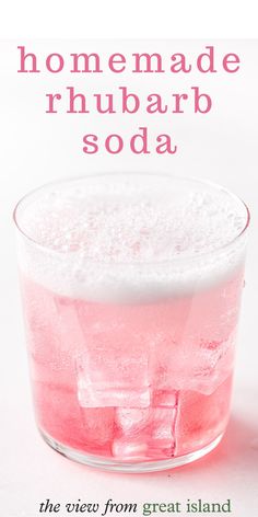 a pink drink in a glass with ice cubes on the rim and text that reads homemade rhubarb soda