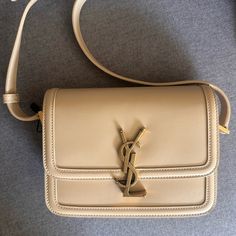 100% Authentic Saint Laurent Logo Solferino Bag. Come With Authentic Card And Dust Bag. Never Worn. Personally Purchased From Store . Ysl Bag Solferino, Ysl Beige Bag, Ysl Solferino Bag, Bags Ysl, Saint Laurent Logo, Ysl Saint Laurent, Saint Laurent Bags, Beige Bag, Clothing Ideas