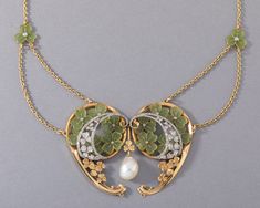 One very beautiful antique necklace, from Art Nouveau era, made in France circa 1900. Made in yellow gold 18k, diamonds enamel a big natural pearl. French hallmarks for gold 18k: the eagle head. The necklace length / turn is 39.5 cm or 15.8 inches. Dimension of enamel / central part: 6.8 cm and 5cm. The pearl measures 13 * 10 mm. Total weight 29.4 grams Art Nouveau Jewelry Vintage, Art Nouveau Necklaces, Emerald Necklace Pendant, Bijoux Art Nouveau, Gold Locket Necklace, French Art Nouveau, Art Nouveau Pendant, Nouveau Jewelry, Pearl And Diamond Necklace