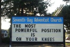 a sign that says the most powerful position is on your knees