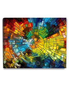 a colorful abstract painting with lots of different colors and shapes on it's surface