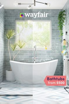 a white bath tub sitting under a window next to a green plant in a bathroom