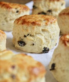 biscuits with raisins are sitting on a table