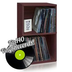 a record shelf with vinyl records on it