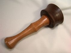 a wooden judge's hammer on a white sheet