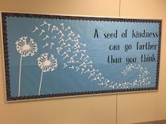 a sign on the wall that says a seed of kindness can go farther than you think