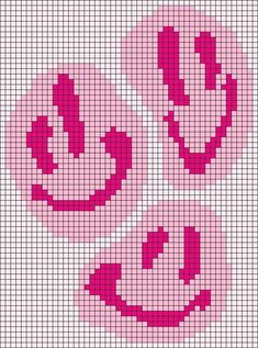 a cross stitch pattern with two smiling faces