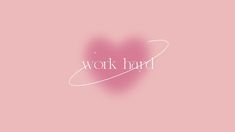 the word work hard written in white on a pink background with a heart shaped shadow