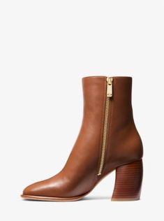 Set on a sculptural block heel for all-day comfort, these leather Maude boots are the new-season update you didn’t know you needed (but you do!). A gilded side zipper adds a pragmatic and polished touch to the classic silhouette. The ankle-grazing boot looks great with casual denim and tailored looks alike. Cognac Boots, Luggage Sizes, Leather Boot, Classic Silhouette, Look Alike, Casual Denim, Boot Shoes Women, Cognac, Side Zipper