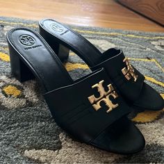 Tory Burch Everly 55mm Leather Heel Block Sandal Size 9 Black Open Toe Heels With Gold-tone Hardware, Black Sandals With Gold-tone Hardware For Evening, Formal Black Sandals With Gold-tone Hardware, Elegant Black Sandals With Gold-tone Hardware, Black Heels With Gold-tone Hardware For Evening, Elegant Black Heels With Gold-tone Hardware, Elegant Tan Leather Sandals, Luxury Tan Sandals For Formal Occasions, Luxury Tan High Heel Shoes