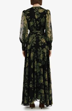 A gently faded floral design decorates a romantic floor-skimming dress in a wrap silhouette framed by sheer blouson sleeves. 56" length (size 4) True wrap style with side tie closure Surplice V-neck Long sleeves Lined 100% polyester Hand wash, line dry Imported Plus Size Mother Of Bride Dresses, Mother Of The Bride Dresses Fall Outdoor, Olive Green Formal Dress, Velvet Dress Long Sleeve, Plus Size Wedding Guest Dress, Dark Floral Dress, Random Clothes, Fall Wedding Guest, Fall Wedding Guest Dress