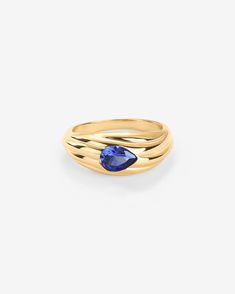 Refine your style effortlessly with our captivating gold-plated ring, featuring a stunning pear-shaped AAAAA CZ stone. With its bold design and hand-picked blue gemstones, this ring exudes elegance and sophistication, adding a pop of color to any ensemble.Materials: 14K Yellow Gold or Rhodium plated AAAAA Cubic Zirconia Hypoallergenic; nickel, lead, and cadmium free Measurements: Stone size: 5 x 7mm; Ring width: 8.5mm. Sizes: #5, #6, #7, #8, #9 Chunky Rings, Gold Plated Rings, Fabulous Jewelry, Blue Gemstones, Cz Stone, White Ring, Everyday Jewelry, Quality Jewelry, Pear Shaped