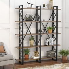 a book shelf with plants and books on it