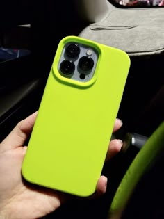 a person holding an iphone case in their hand