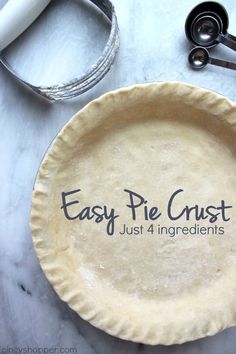 an easy pie crust just 4 ingredients on a table with scissors and other crafting supplies