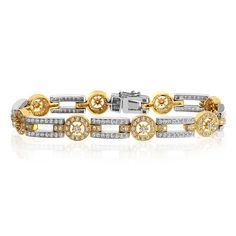 A stylish a versatile piece that is perfect for either day or night. This dazzling bracelet fashioned in 18K white and yellow gold features a lustrous two-tone look encrusted with 3.00ctw (G VS-2) of white diamond accents. Secured with a tongued clasp and measuring 7.0 inches, this piece is destined to bring class, elegance and style. For more information, contact Avital & Co Jewelry at (212) 764-6851 Payment: Payment must be received within 2 business days of the sale being completed. We ar Luxury Yellow Gold Diamond Bracelet With Brilliant Cut, Luxury Brilliant Cut Yellow Gold Diamond Bracelet, Luxury Pave Setting Tennis Bracelet For Anniversary, Luxury Tennis Bracelet With Pave Setting For Anniversary, Luxury Diamond Bracelet With Polished Finish, Luxury White Gold Bracelet With Pave Setting, Luxury Round Diamond Bracelet With Polished Finish, Luxury Gold Bracelet With Pave Setting For Formal Occasions, Luxury Yellow Gold Diamond Bracelet For Anniversary