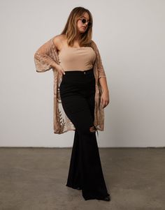 An easy piece to throw over a cute outfit on a warm day, the Curve Sheer Lace Cardigan is a fun addition to any look. A plus size duster, this piece is great to wear to festivals or the beach. Wear it over a cute tank or long sleeve to show off the lacey details. This plus size sheer cardigan features short sleeves and a delicate sheer lace pattern. This cardigan is made from 50% polyester and 50% nylon. Hand wash cold. Imported. Trendy One Size Outerwear For Beach, Trendy One-size Beach Outerwear, Chic Beach Cover-up Cardigan For Fall, Chic Cardigan For Beach Cover-up In Fall, Spring Beach Cover-up Duster, Long Fall Cover-up For Day Out, Oversized Open Front Cover-up For Fall, Fall Open Front Cover-up For Day Out, Stretch Cardigan For Beach In Spring