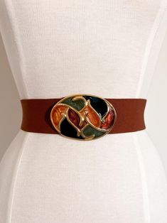 80s vintage cinnamon elastic belt with autumn colors enamel buckle / 30.5" - 35" waist / made by nan lewis elastic has some puckering if not pulled taught around waist otherwise excellent condition! ------------------------------------------------------------------------------------------- Please message questions prior to purchase. Once shipped, sales are final, no return/exchange. But please contact me if you have any problems with your order. Please see FAQs for more information on shop policies. Thanks! Vintage Brown Embroidered Belt, Retro Brown Adjustable Belt, Statement Belt, Elastic Belt, Autumn Colors, Suspender Belt, 80s Vintage, Belt Size, Suspenders