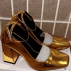 Beautiful Gold Shoes. Great For The Holiday Season Gold Flat Heel Heels For Fall, Gold Closed Toe Court Shoes With Heel Strap, Metallic Patent Leather Heels With Round Toe, Metallic Round Toe Patent Leather Heels, Gold Closed Toe Court Shoes Medium Width, Gold Closed Toe Court Shoes With Reinforced Heel, Gold Patent Leather Block Heels, Size 12 Heels, Clarks Boots