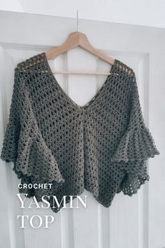 the crochet yasmin top is hanging on a white door with text overlay