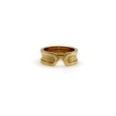 This is part of Chairish's Fine Jewelry Collection.  This 18k gold ring is a play on the classic double-c Cartier design. An abstracted c raises up as an exterior border that continues around the band. Two c’s back up against each other, meeting at a sharp point in the middle of the ring for a clean, modern look.  The outside border has a high polish, while the interior layer has a brushed gold finish. The design is subtle and simplistic, and the ring makes for an excellent staple in any jewelry Timeless Polished Promise Band, Timeless Promise Band With Polished Finish, Classic Open Band Wide Promise Ring, Classic Wide Band Open Promise Ring, Timeless 14k Gold Wide Band Ring With Open Band, Timeless 14k Gold Wide Band Ring With Open Design, Timeless Wide Band Open Ring In 14k Gold, Timeless Wide Band 14k Gold Open Ring, Formal Fine Jewelry Wide Band Ring With Open Band