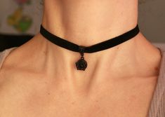 Absolutely black necklace with polymer clay flower and velvet ribbon. Each petal of flower made by hand Flower's size approx 13 -15mm/0.5-0.6 in across Length of necklace is adjustable: 9-11 inches/ 22,8- 27,9 cm 10-12 inches/ 25,4 - 30,5 cm 11-13 inches/ 28-33 cm 12-14 inches/ 30.5- 35.5 cm 13-15 inches/ 33-38 cm 14-16 inches/ 35.5 cm-40.5 cm 15-17 inches/ 38,1 cm- 43,2 cm 16-18 inches/ 40.6 cm- 45.7 cm 17-19 inches/ 43 cm - 48 cm 18-20 inches/ 40,5- 50,8 cm Width of ribbon 10 mm / 0.4 inches I Black Flower Choker As A Gift, Adjustable Black Jewelry With Flower Charm, Black Rose Choker Outfit, Adjustable Black Flower Jewelry, Black Flower Choker For Gifts, Elegant Black Choker With Black Ribbon, Black Adjustable Flower Pendant Necklace, Adjustable Black Flower Pendant Necklace, Black Ribbon Choker Necklace