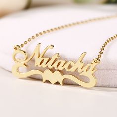 A romantic style,this personalized name necklace is paired with heart. You can write your own name,or the name of someone you are head over heals for,or even a favorite word that you use for inspiration.Chain Type: Cable chainMaterial: 925 SilverPlating Color: Silver, Yellow Gold, Rose Gold Elegant Customized Heart Nameplate Necklace, Heart Shaped Name Necklace For Mother's Day, Heart-shaped Name Necklace As Personalized Gift, Personalized Heart Pendant Name Necklace As Gift, Custom Name Heart Pendant Necklace As Personalized Gift, Elegant Double Heart Custom Name Necklace, Elegant Custom Name Double Heart Necklace, Custom Heart Necklace With Name For Valentine's Day, Personalized Heart Name Necklace For Personalized Gift