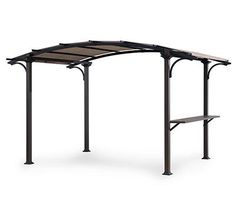 an outdoor gazebo that is made out of metal and has a brown canopy over it