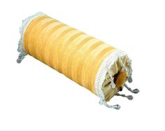 a yellow and white striped roll with silver trim on it's end, sitting in front of a white background