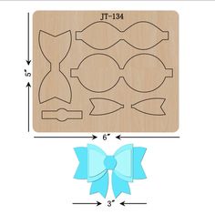 a wooden cutting board with an image of a bow on it and the cut outs