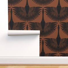 an image of a wallpaper with black and brown designs on the wall next to a white door