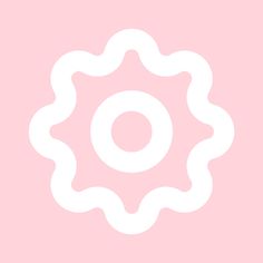 a pink background with a white circular design on the center and bottom part of it