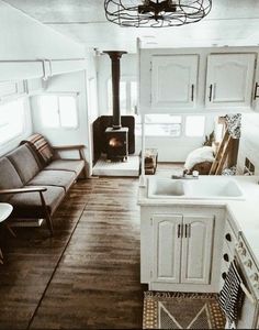 a kitchen and living room in an rv