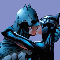 batman kissing the face of another man in front of a purple background with blue and red colors