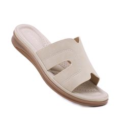 Walk with comfort and style in our Siketu Off the Coast Cushioned Flat Sandals. The perfect blend of fashion and practicality, these sandals provide cushioned support for your feet while boasting a trendy coastal look. Available in apricot, add a touch of whimsy to your summer wardrobe. Cheers to happy feet! 0.98'' heel Slip-on PU upper Synthetic Arch support footbed™ Cushioned Insole™ Anti-skid rubber sole The Coast, Arch Support, Summer Wardrobe, Flat Sandals, Apricot, Rubber Sole, Arch, Walking, Slip On