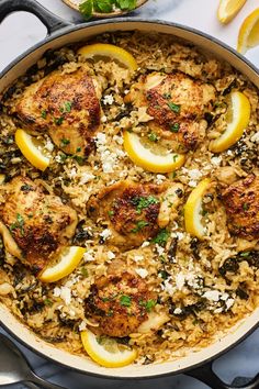 chicken and rice with lemons in a skillet