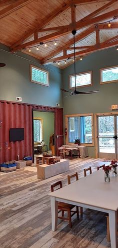 a large open room with tables and chairs