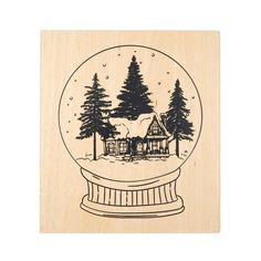 a snow globe with a house in the middle and trees around it, on a white background