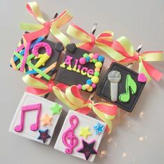 decorated cookies with name and music notes on them