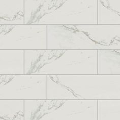 a white marble tile wallpaper with grey veining on the top and bottom part