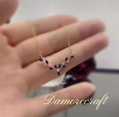 Materials: Sterling silver Gemstone: 5 A Cubic Zirconia Gem color: Blue Adjustable length Style: Minimalist ○Material:  Gold filled over Sterling Silver ○ Color: Yellow Gold ○ Gemstone: Cubic zirconia ○ Stone Color: Blue ○Pendant size: 20mm*18mm ○Necklace length: 38+3+3cm All of our jewelry are hypoallergenic and tarnish resistant. We wish to create lasting pieces that everyone can cherish, no matter the price point. O T H E R ∙ I N F O R M A T I O N * All items are nicely packaged ready to gift Sept Birthstone, Plant Necklace, Antler Necklace, Leaf Plant, Blue Pendant, Necklace Dainty, Gold Plated Silver, Elegant Jewelry, Silver Blue