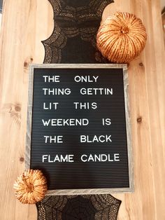 a sign that says the only thing getin lit this weekend is the black flame candle