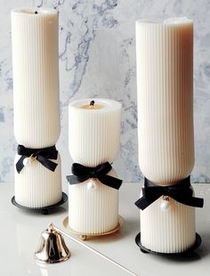 Flickering candle lights create the perfect ambiance bringing tranquility and warmth to your home. As we entre a festive period in anticipation of dinner parties with family and friends, these make for a stunning center piece.  Our Hourglass candles are available in different variations, singular or as a pair, scented or unscented.  warning: Burn within sight. Keep away from flammables. Keep away from children and pets. Remove satin ribbon before burning the candle. Fancy Candles, Flickering Candle, Candle Burner, Candle Making Business, Black Candle, Satin Noir, Candle Aesthetic, Candle Art, Candle Packaging